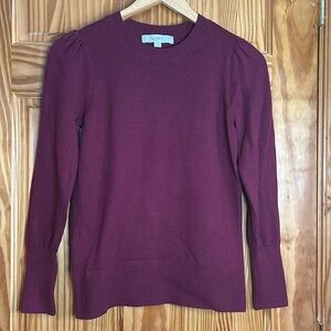 Loft sweater. Women’s size extra small. Maroon in color with a ruffled sleeve.
